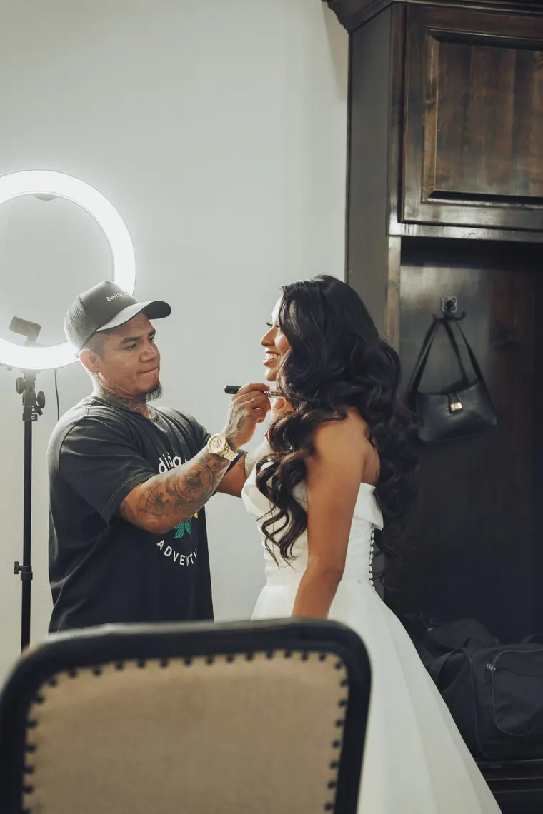 Final touches to the bride’s makeup