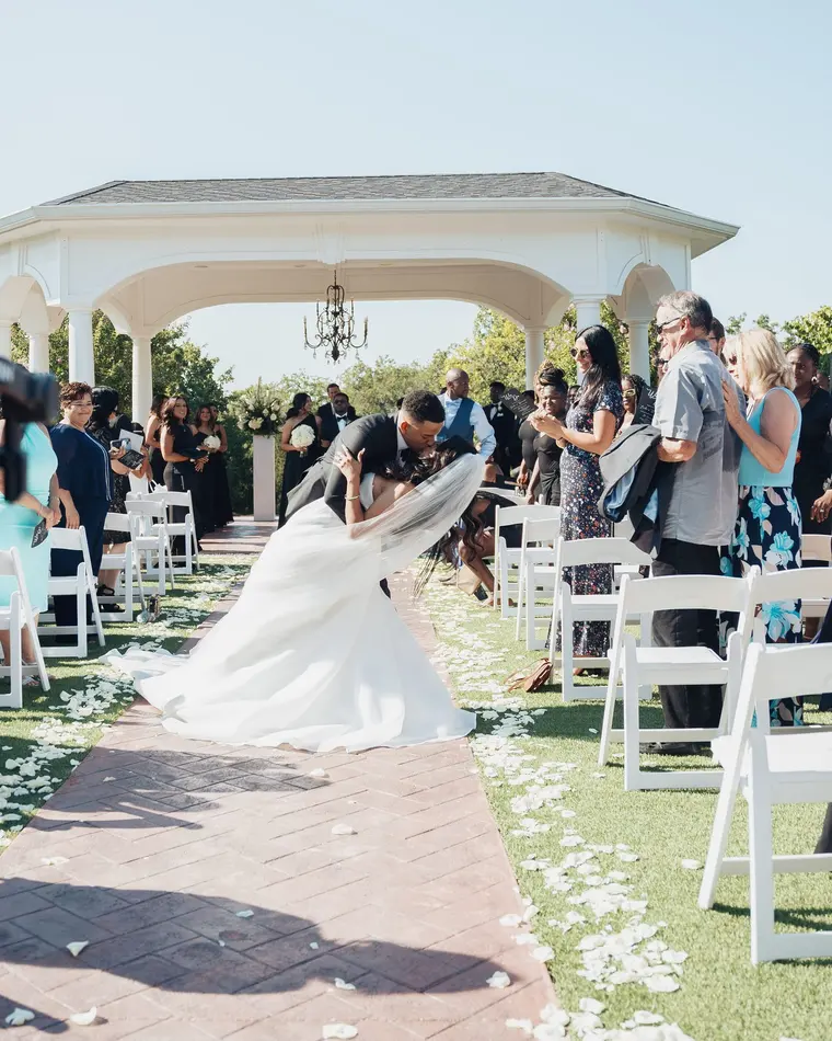 A kiss in the aisle, on the way back out